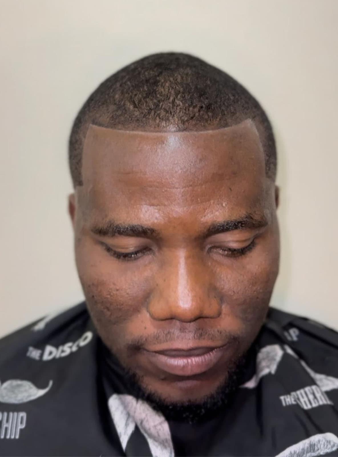 Photo from IJ Cuts Barbershop's website