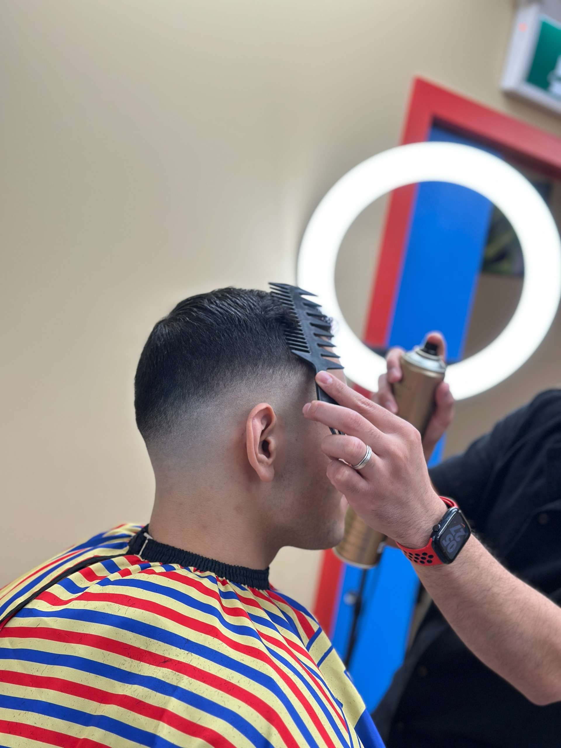 Photo from Magnum Barbershop Beltline's website