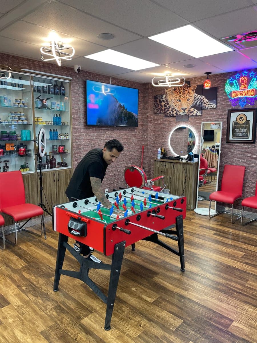 Photo from Magnum Barbershop Kensington's website